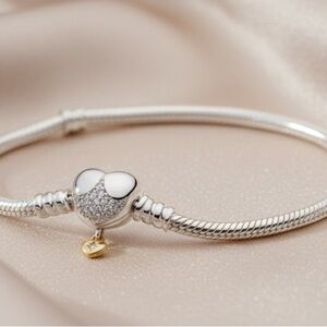 Elegant Silver Heart Bracelet with Gold Charm